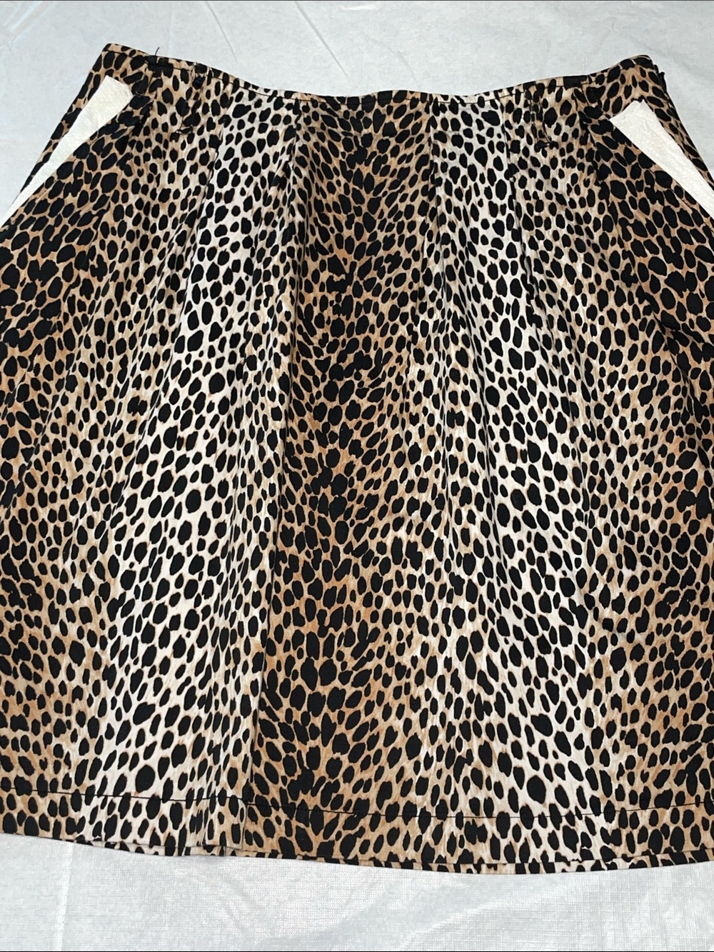 White House Black Market lined/side pockets/midi Leopard print skirt. Size: 12